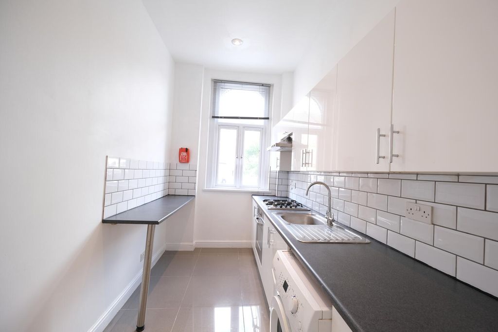 Property photo 3 of 12 Kitchen