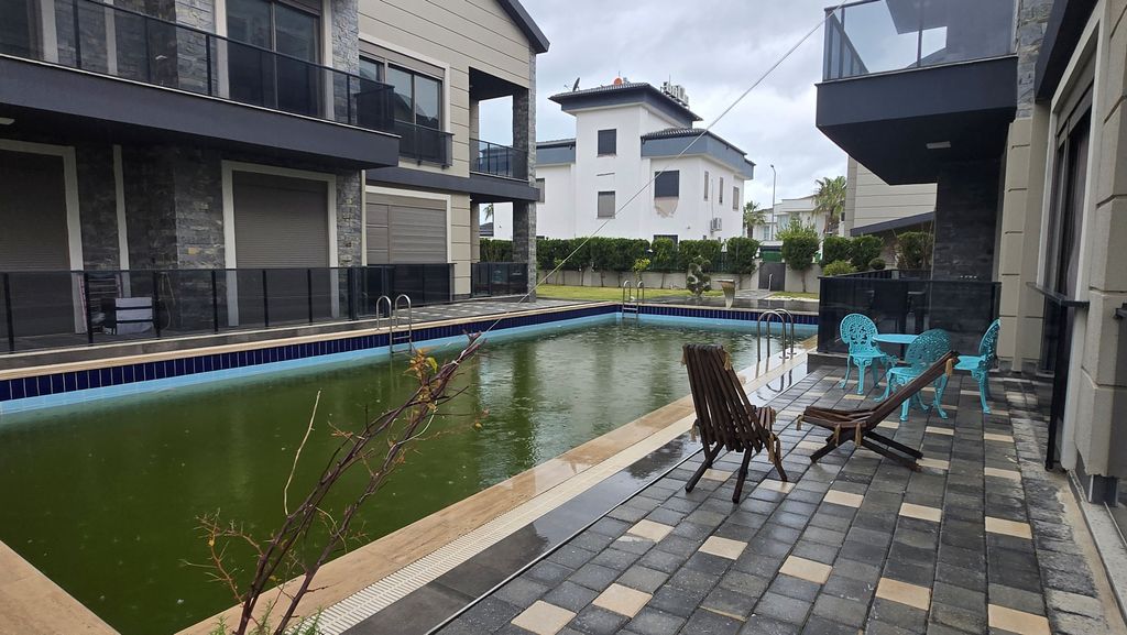 Property photo 2 of 11 Tasteful Belek Apartment In Antalya For Sale - Communal Swimming Pool And Sunbathing Terrace
