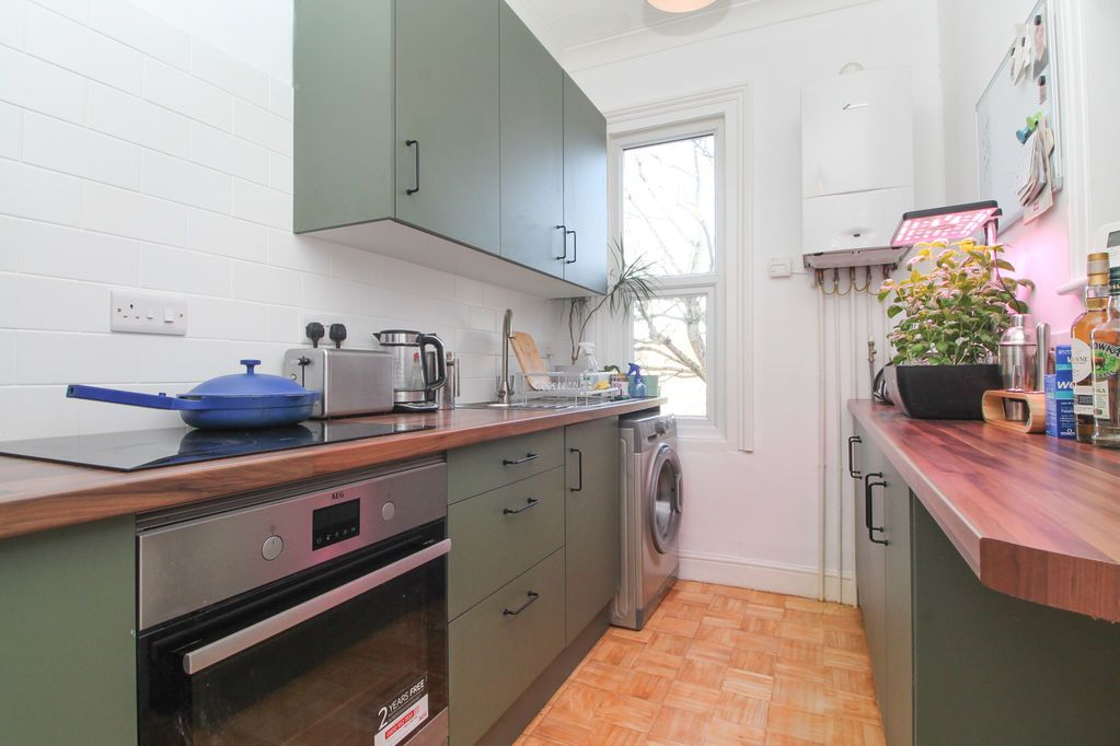 Property photo 3 of 12 Kitchen