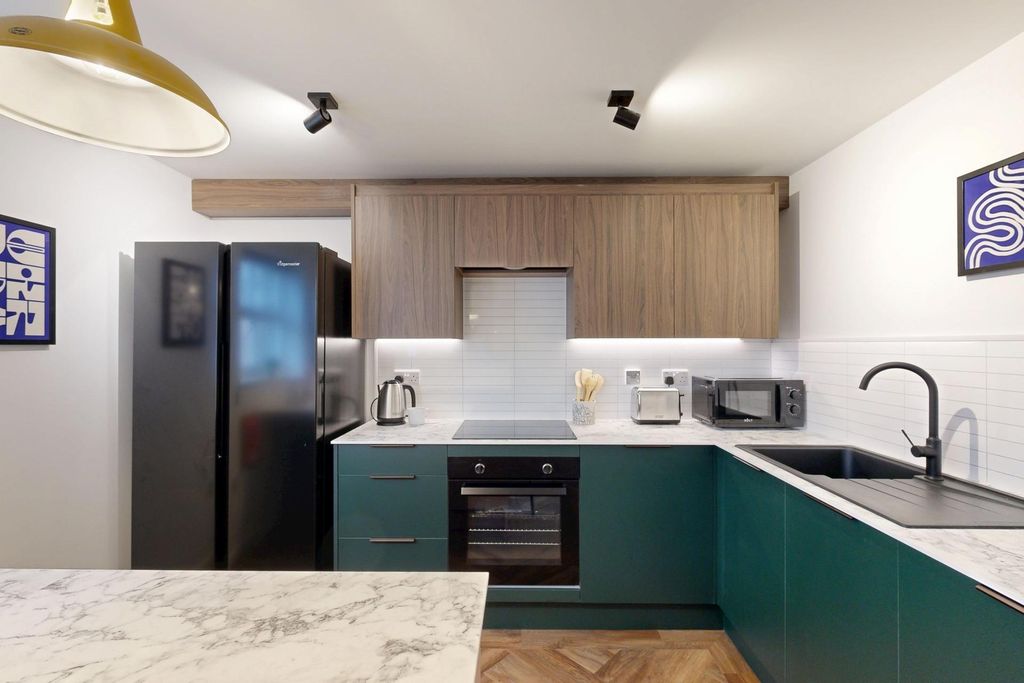Property photo 3 of 30 Modern Fitted Kitchen With Green Lower Cabinets An...