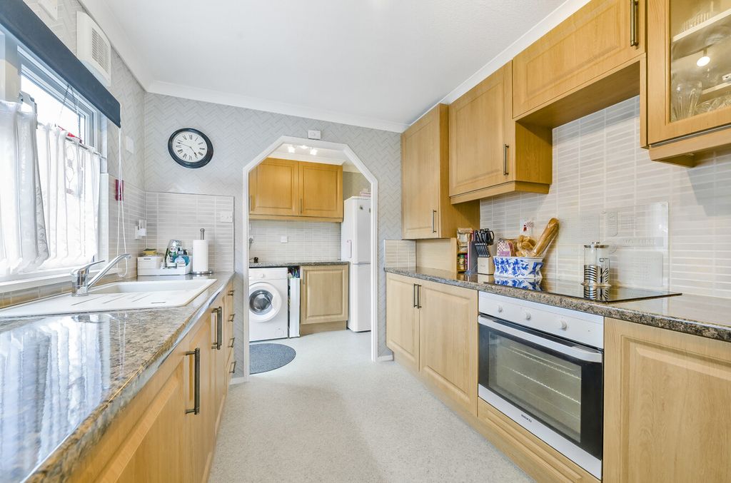 Property photo 3 of 12 Kitchen / Utility
