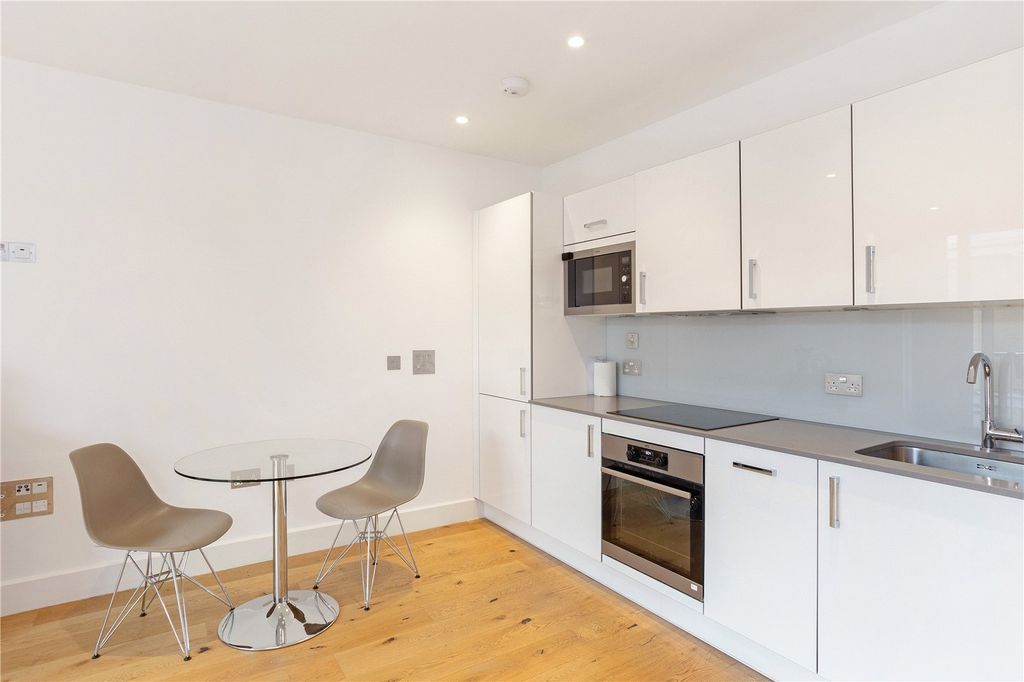 Property photo 3 of 8 Kitchen Area