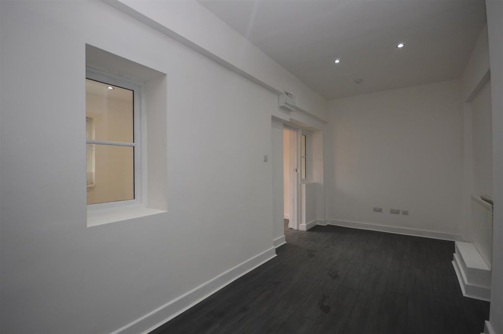 Property photo 3 of 9 Front