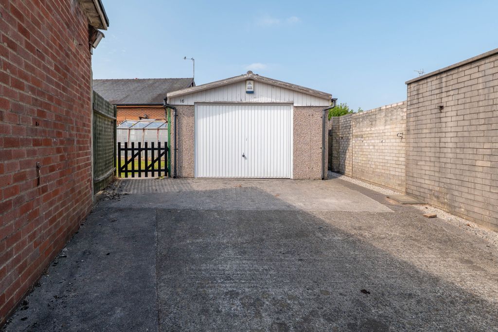 Property photo 2 of 16 Garage And Drive
