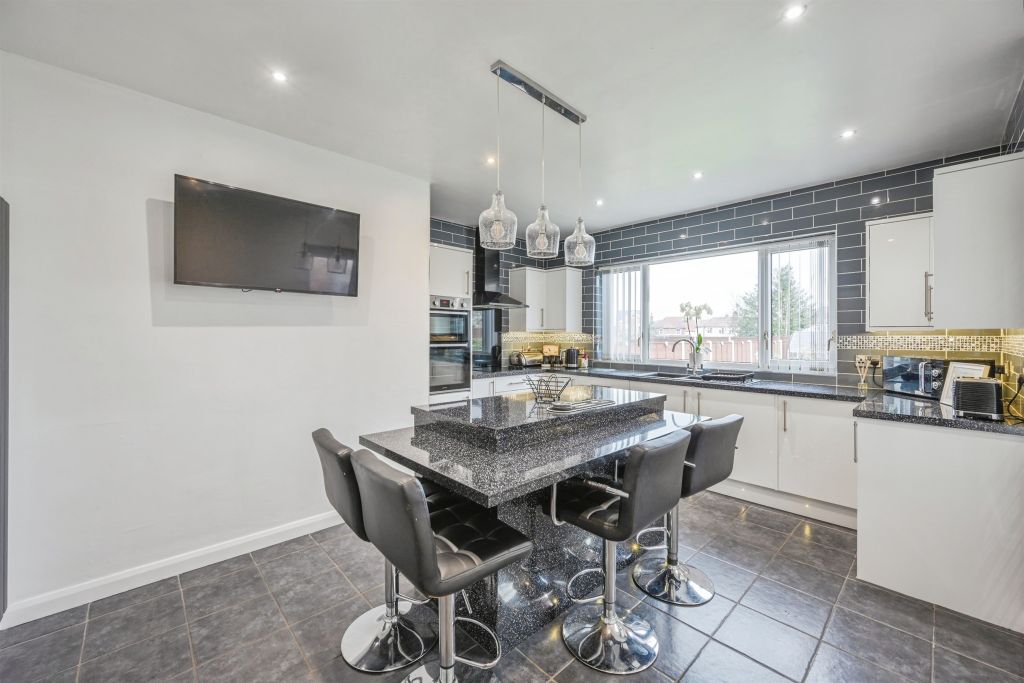 Property photo 3 of 18 Breakfast Kitchen: