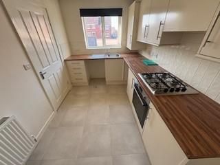 Property photo 3 of 12 Kitchen