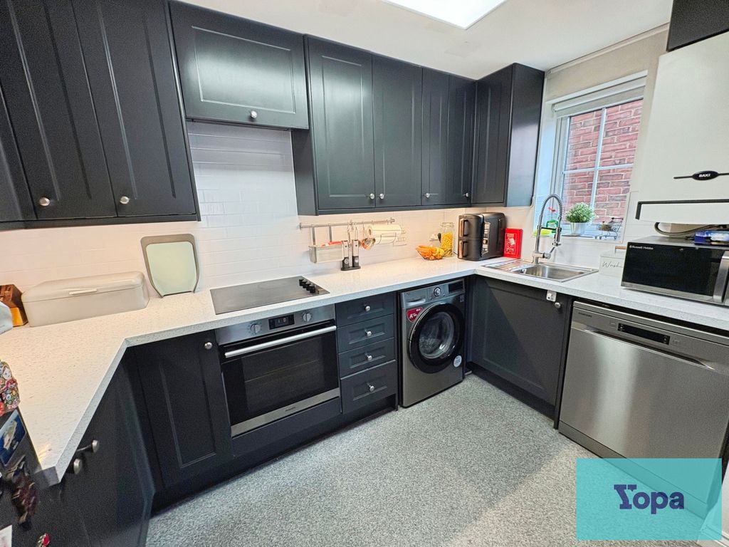 Property photo 2 of 12 Kitchen