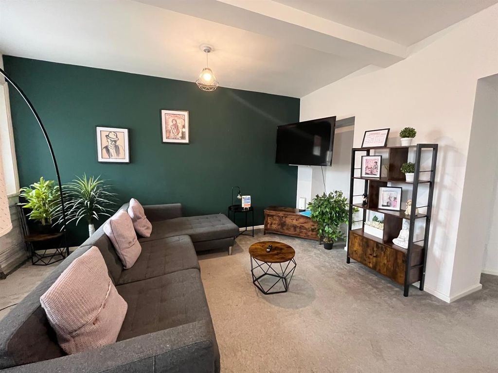 Property photo 2 of 10 Living Area