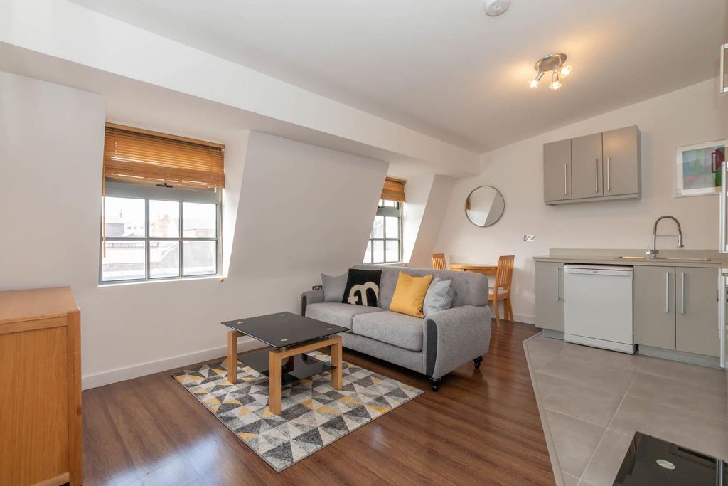 Property photo 1 of 8 Living Area