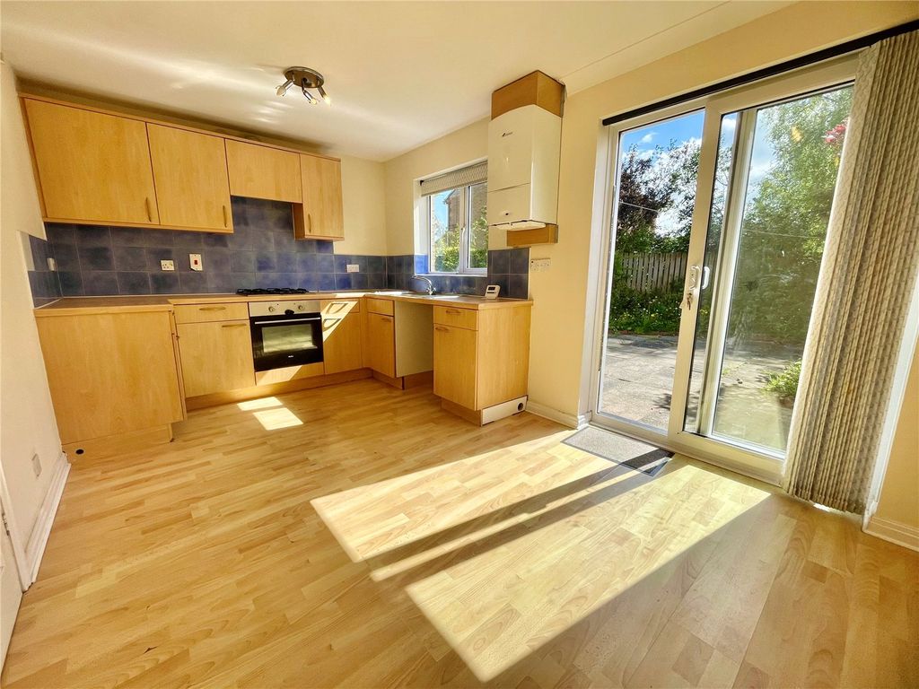Property photo 3 of 12 Dining Kitchen