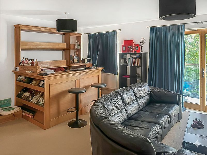 Property photo 1 of 11 Ainsworth Living-Bar.Jpg