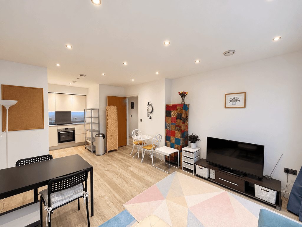 Property photo 2 of 6 Bright, Clutter-Free Living Room And Kitchen