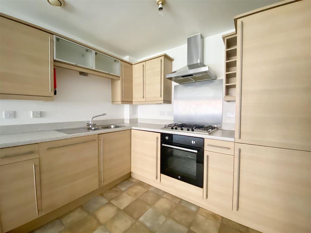 Property photo 2 of 12 Kitchen Area