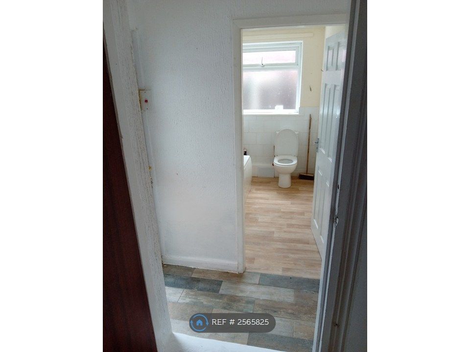Property photo 2 of 8 Bathroom And Door To Garden