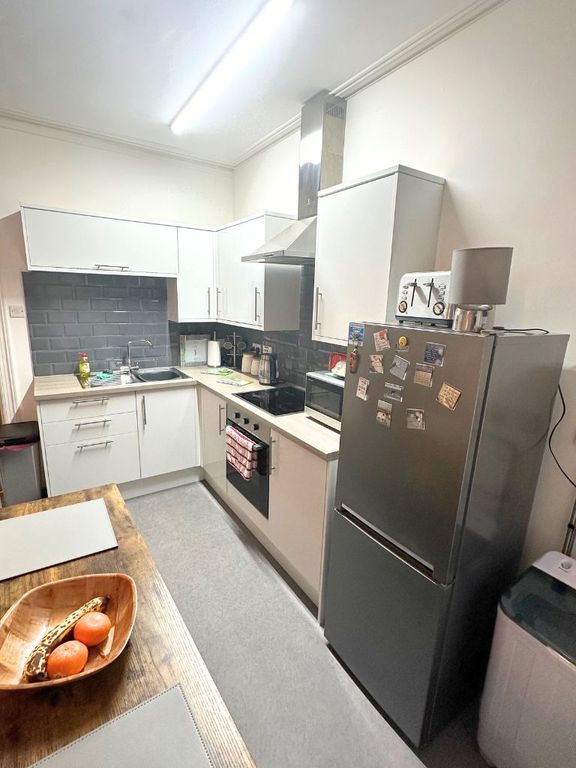 Property photo 2 of 6 Kitchen Area