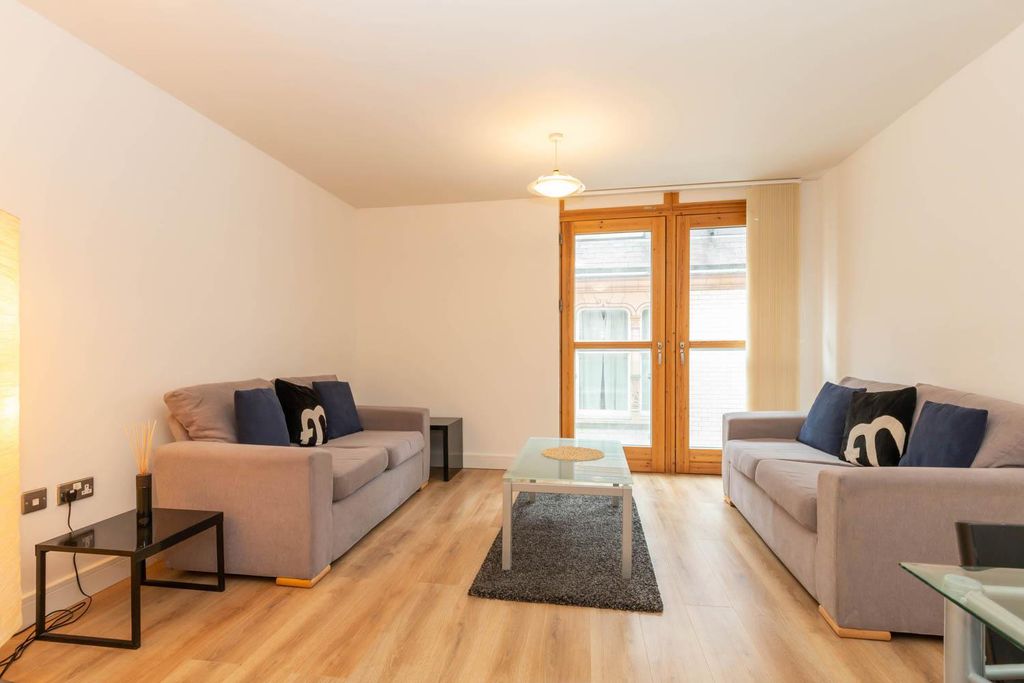 Property photo 1 of 10 Living Area
