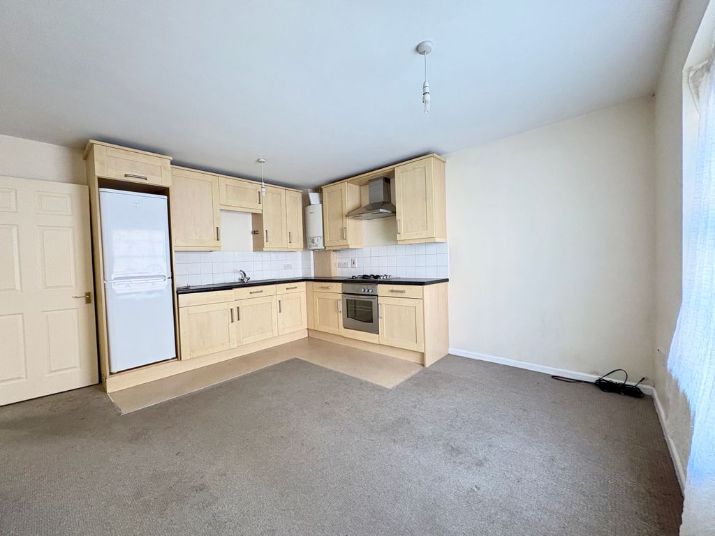 Property photo 2 of 9 Kitchen Living