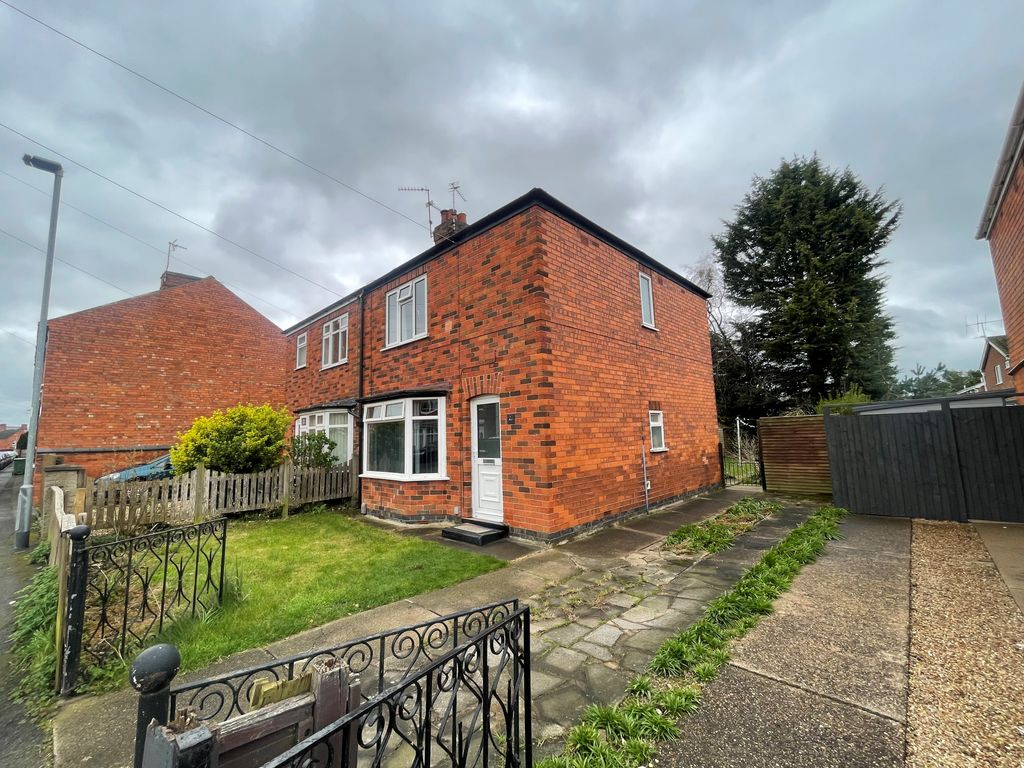 Property photo 2 of 11 Front-Side View Of House