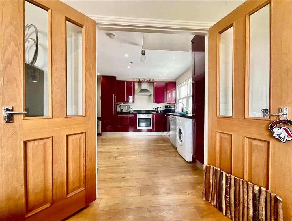 Property photo 3 of 11 Hallway Into Kitchen