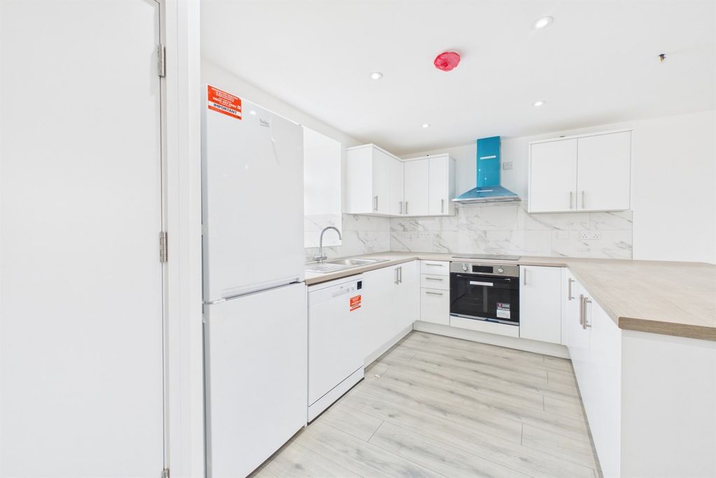 Property photo 2 of 12 Kitchen