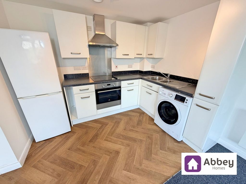 Property photo 1 of 9 Kitchen Area