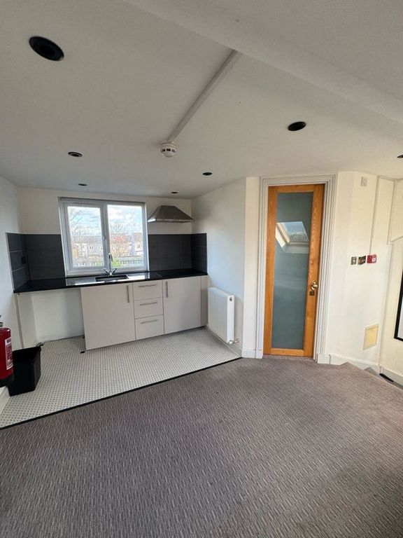 Property photo 3 of 8 Kitchen View