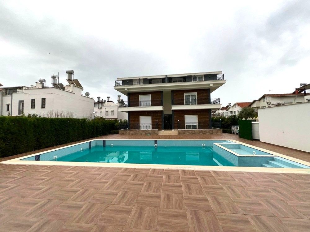 Property photo 1 of 18 Centrally Located &amp; Ready-To-Move Apartment In Belek, Antalya For Sale - Mian View Of The Apartment Block