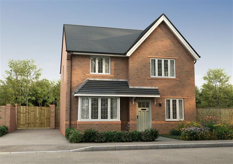 Property photo 1 of 10 A Modern Brick House With A Light Green Door Sits On A Paved Driveway