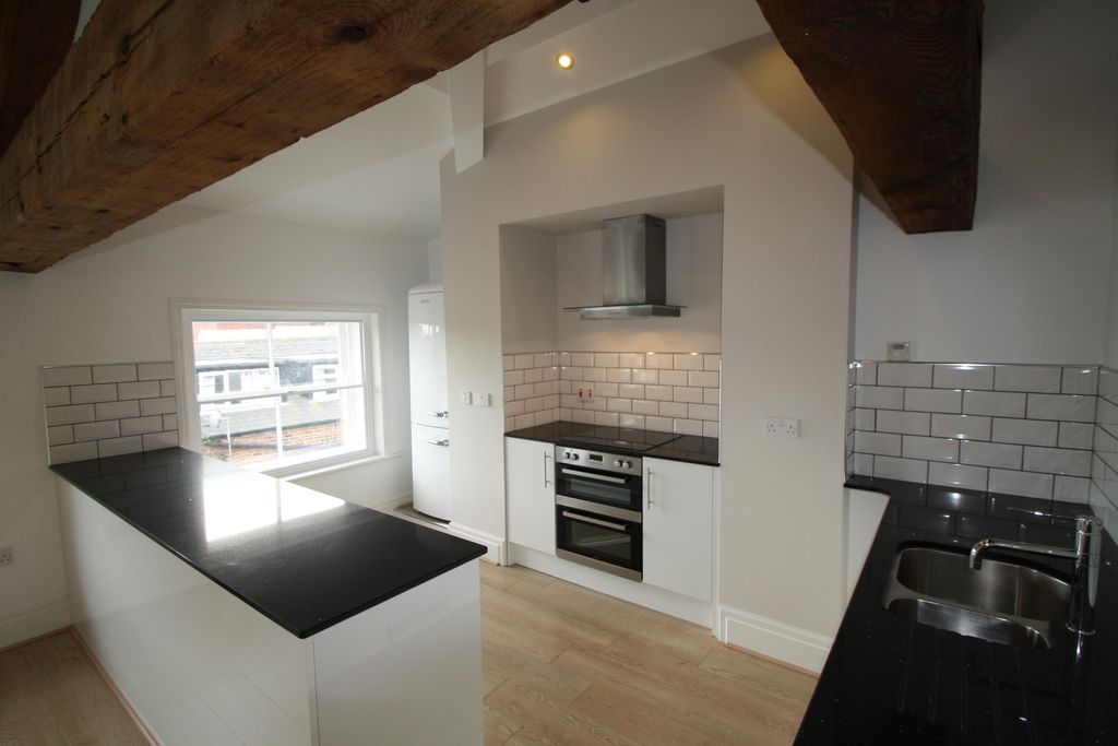 Property photo 3 of 8 Kitchen