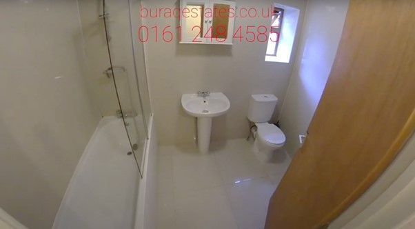 Property photo 2 of 14 A Spacious Bathroom Featuring A Large Bathtub And ...