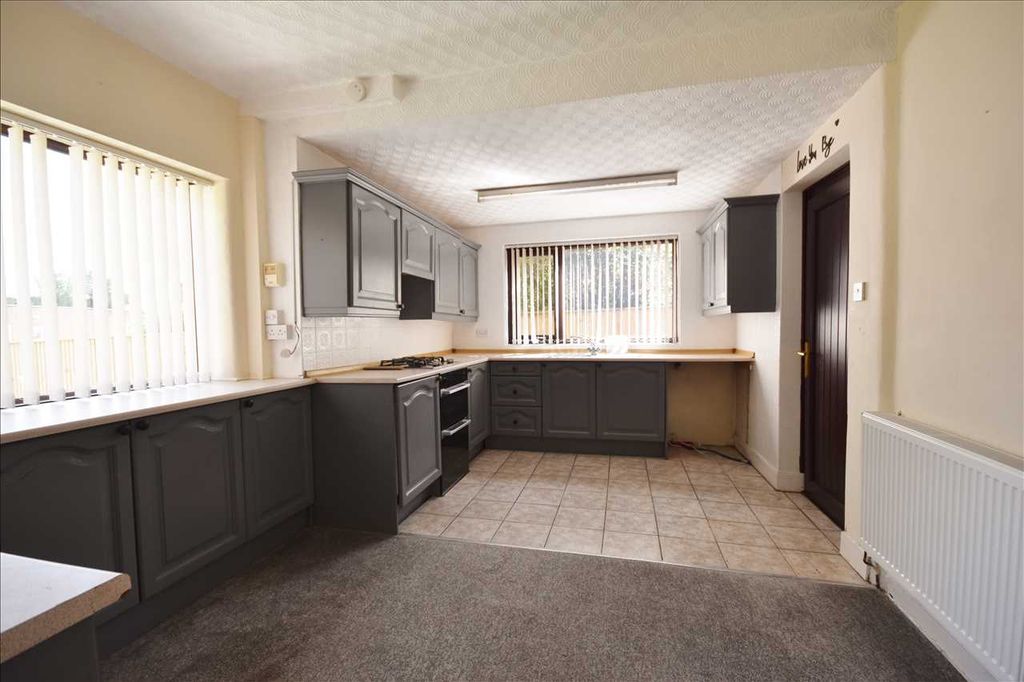 Property photo 3 of 8 Dining Kitchen