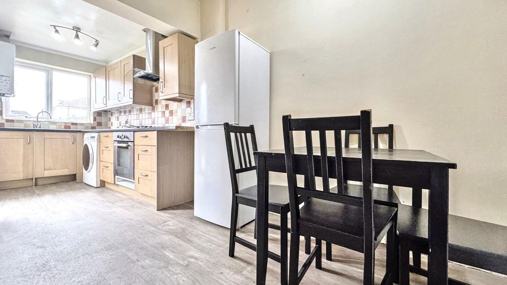 Property photo 2 of 13 Modern Kitchen With Bright Dining Area...