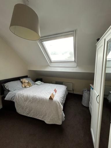 Property photo 2 of 48 A Cozy And Well-Maintained Bedroom With A Comforta...