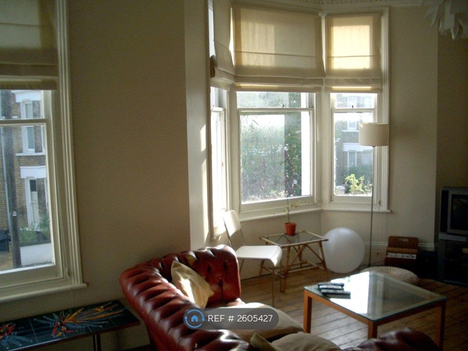 Property photo 1 of 9 Front Room - Home Photo Old Sofa And Tables