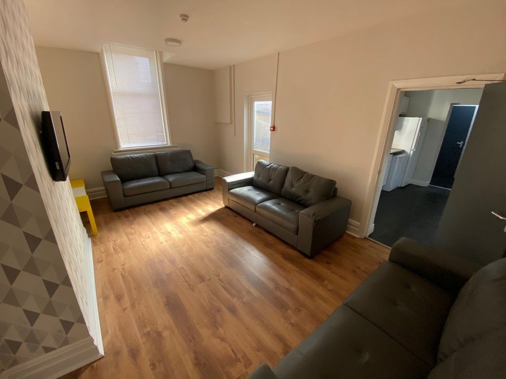 Property photo 2 of 17 A Spacious And Inviting Modern Living Room, Perfec...