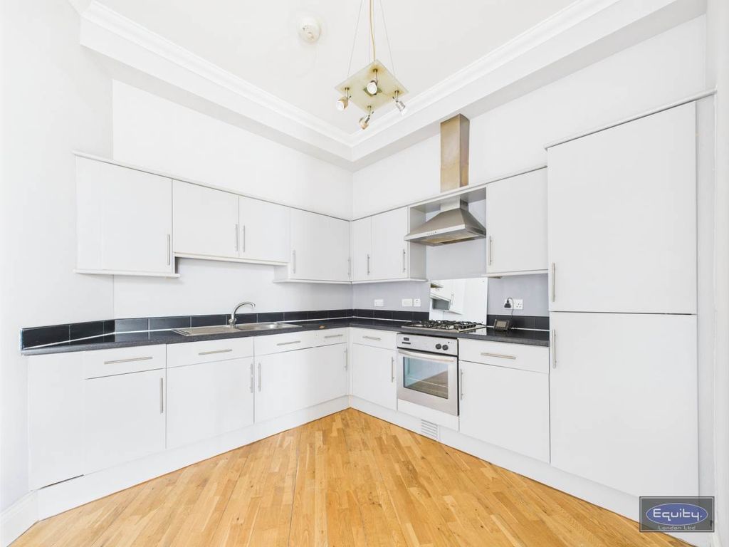 Property photo 2 of 8 Kitchen