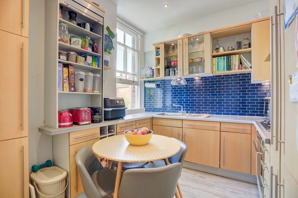 Property photo 3 of 12 Kitchen