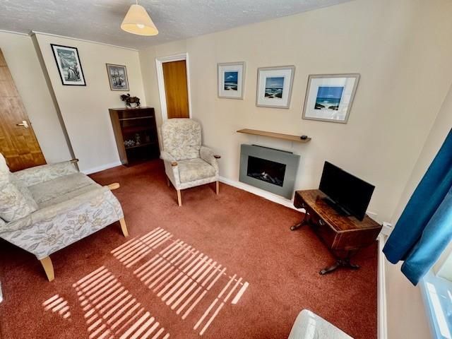 Property photo 3 of 12 Living Room
