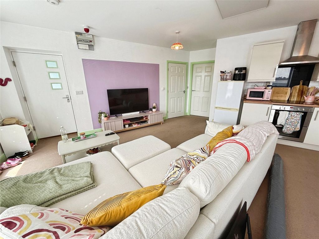 Property photo 3 of 12 Living Area