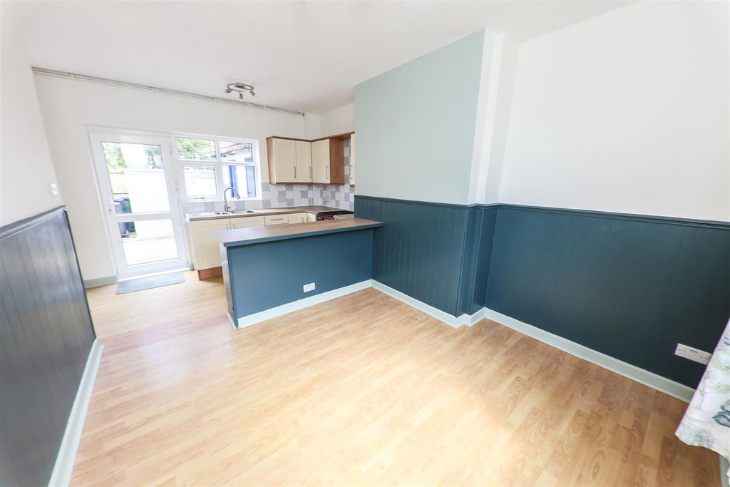 Property photo 3 of 16 Dining Kitchen