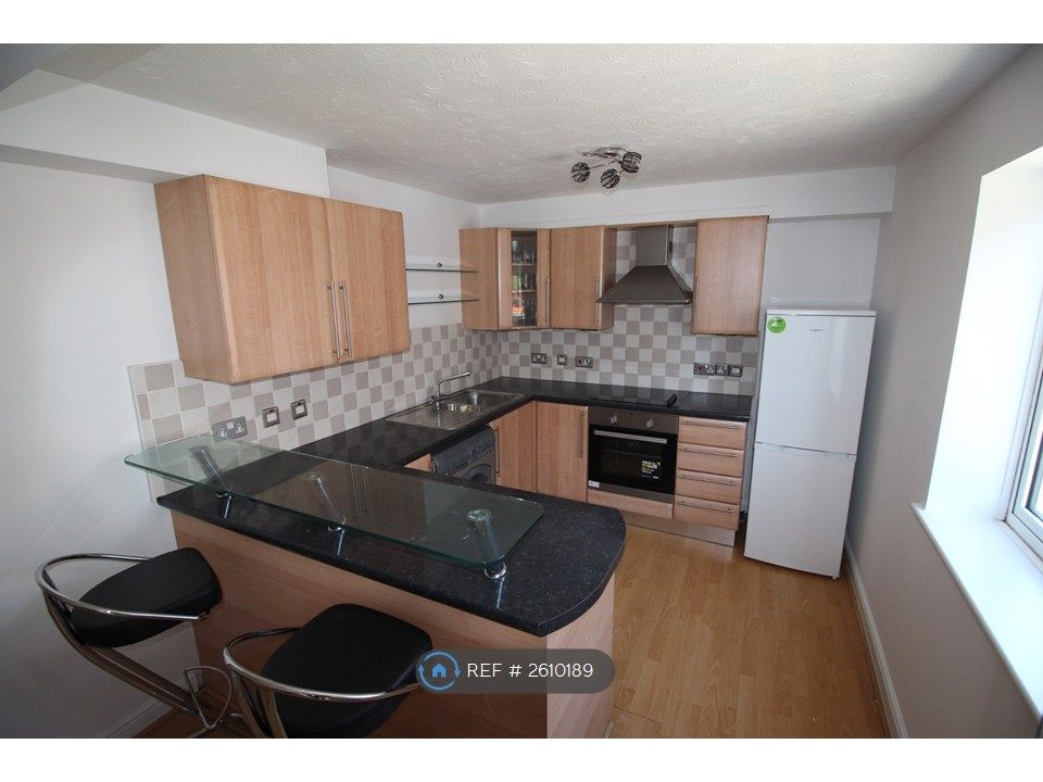 Property photo 1 of 8 Kitchen Area