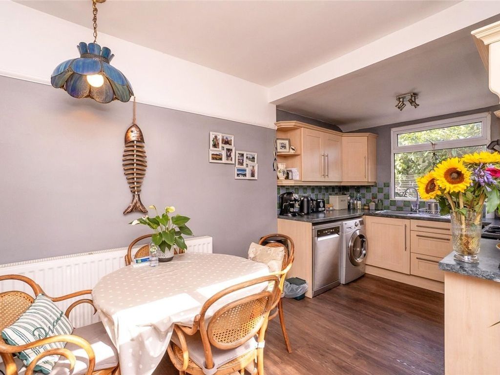 Property photo 3 of 7 Bright And Inviting Kitchen Featuring Modern Appli...