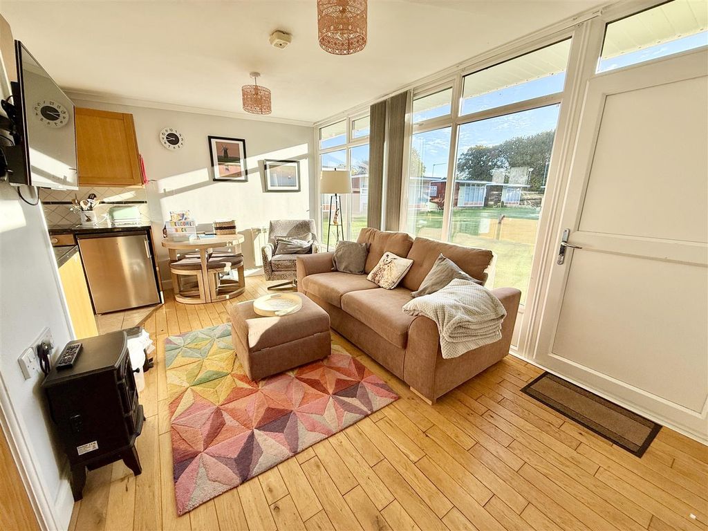 Property photo 2 of 11 Living Area