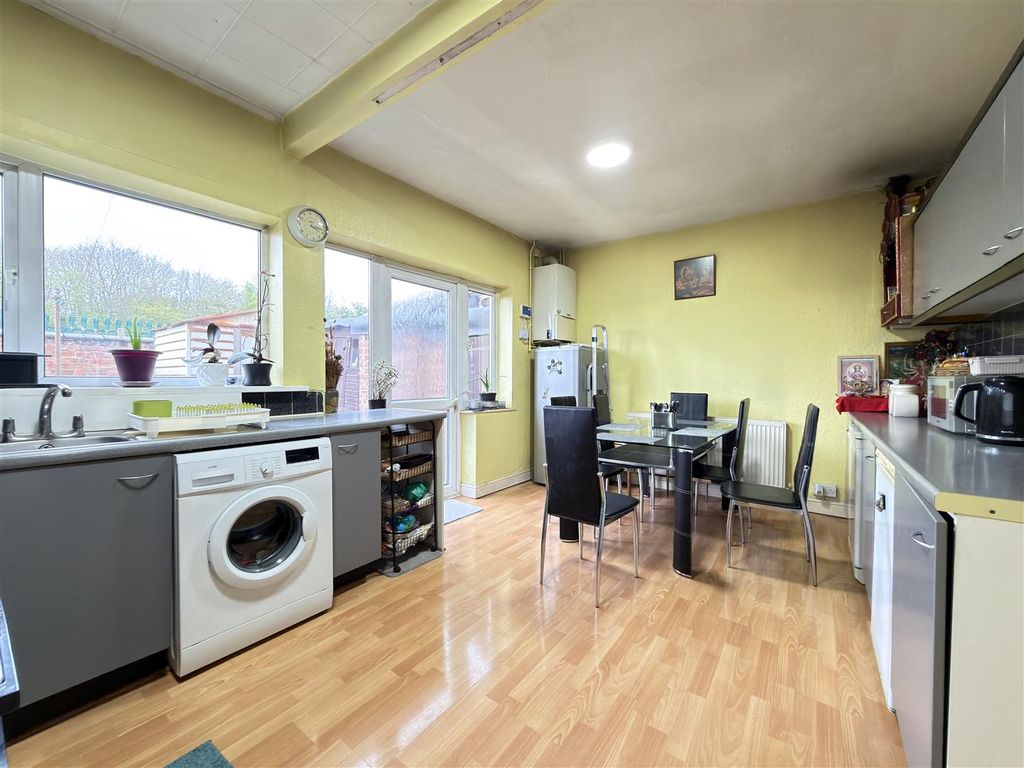 Property photo 3 of 12 Kitchen &amp; Dining Room