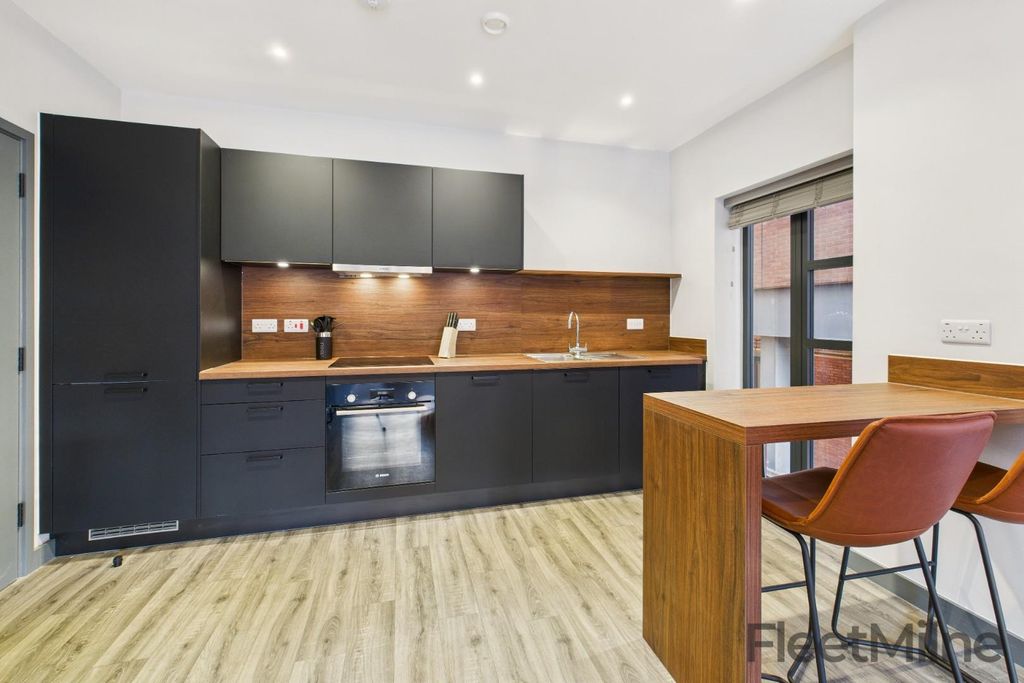 Property photo 3 of 12 Kitchen