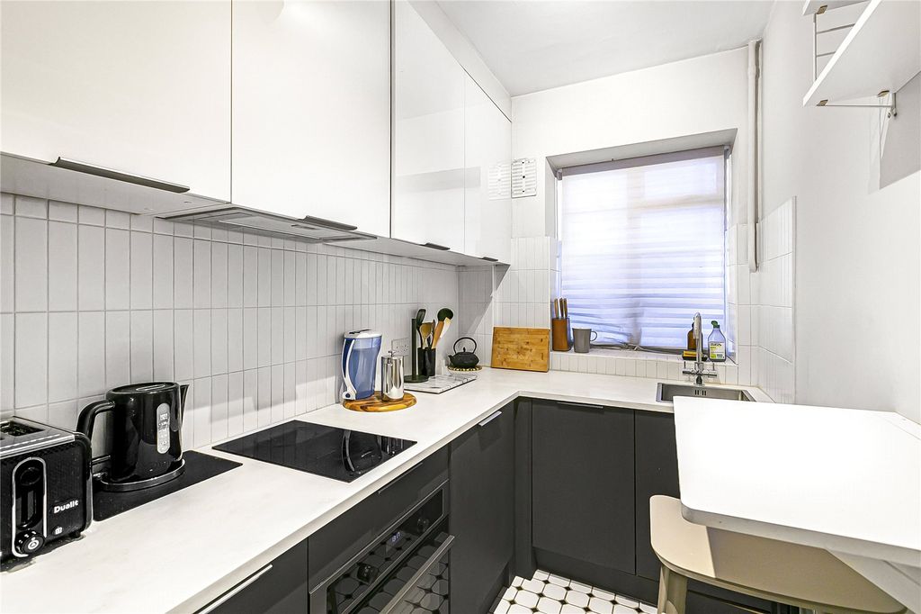 Property photo 3 of 12 Kitchen