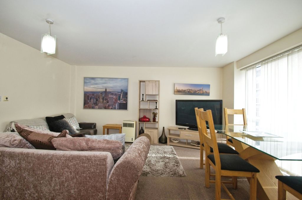 Property photo 3 of 17 Living/Dining Area