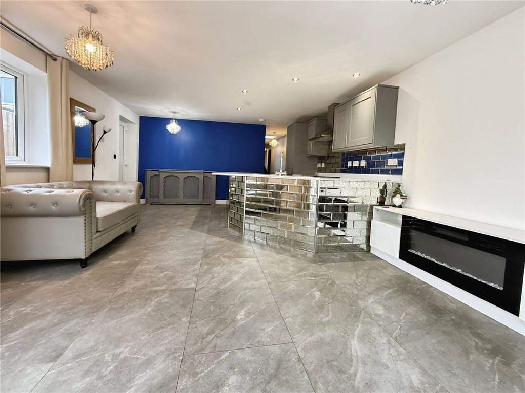 Property photo 3 of 8 Kitchen/Living Room