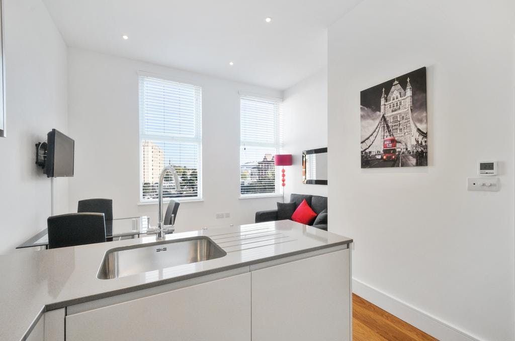 Property photo 3 of 7 Bathroomandlivingroom.Jpg