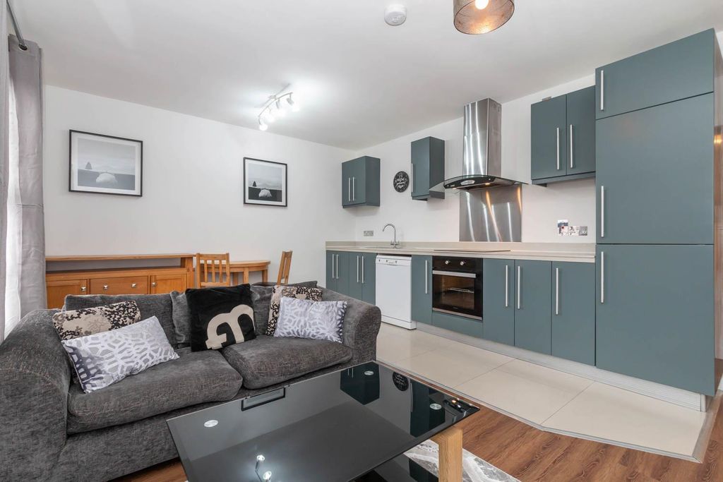 Property photo 3 of 13 Living Area